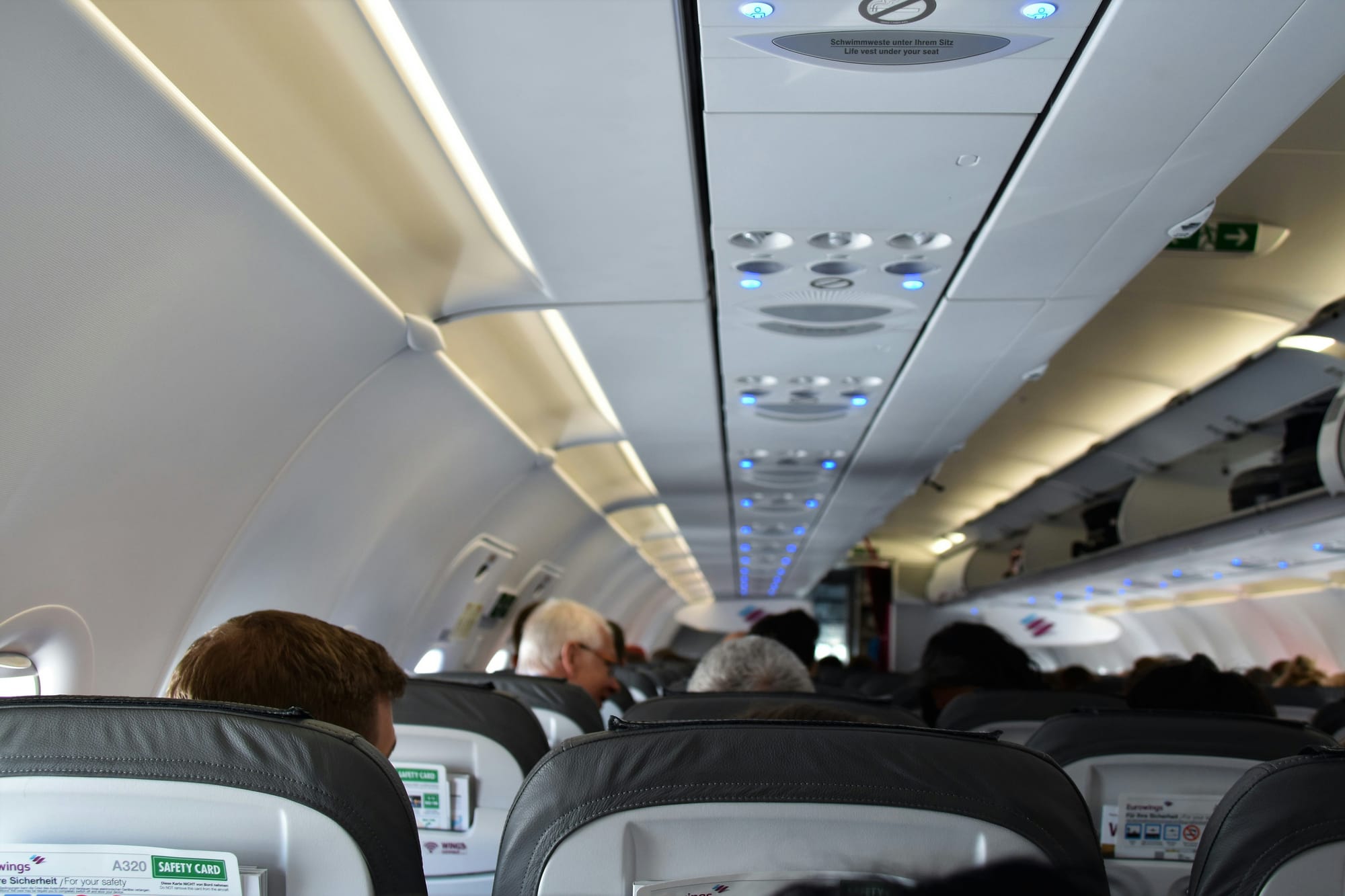 Stuck in Economy When You Paid for First Class? Here's What to Do About an Involuntary Downgrade